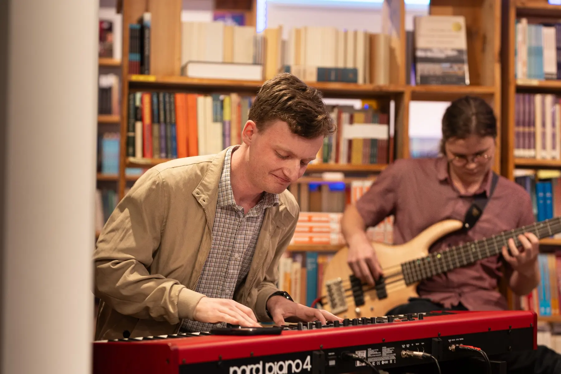 Reuben performing jazz piano with a bass player
